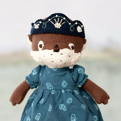 portrait of clara otter wearing riverbank dress and riverine queen crown