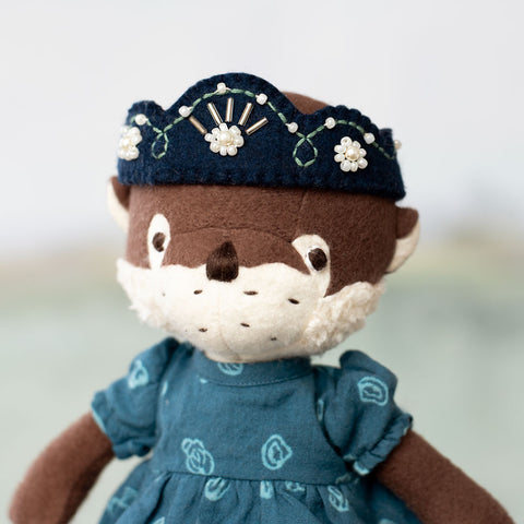 portrait of clara otter wearing riverbank dress and riverine queen crown