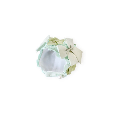 pondweed swim cap flat lay