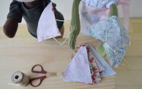 May Day Bunting -- Sewing the triangles together