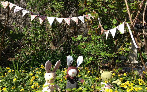 May Day Bunting -- Hanging the bunting outside