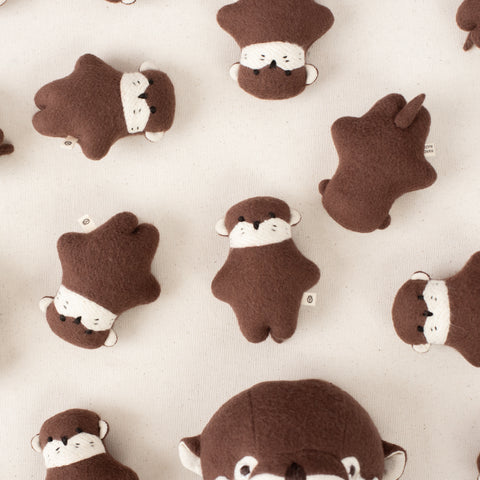editorial of many mini otters