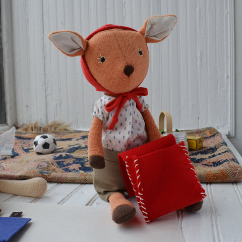 Phoebe Fawn with doll backpack